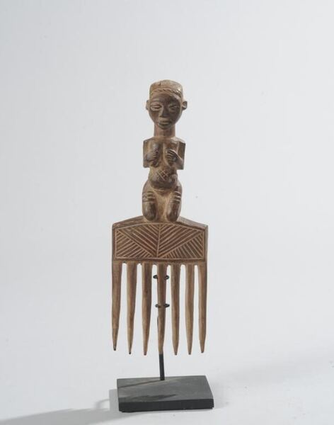 African Comb with Kneeling Female Figure