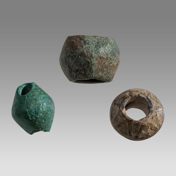 Three Roman Lead Spindle Whorls