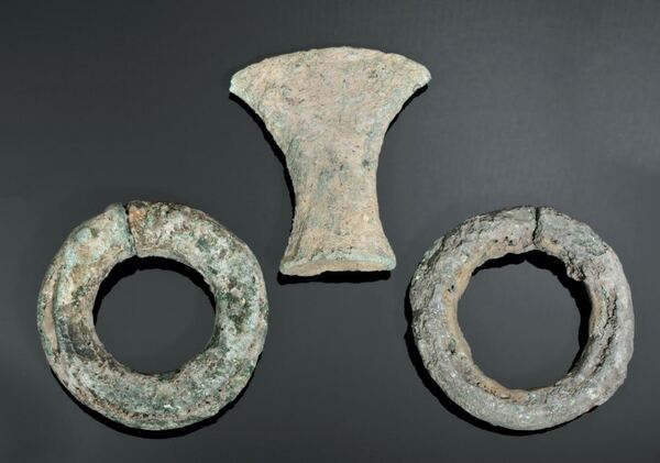 Two Dong Son Bronze Bracelets and an Axe Head