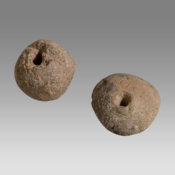 Two Roman Clay Spindle Whorls