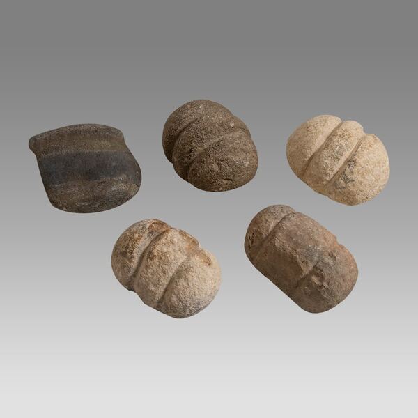 Five African Carved Stone Pestles