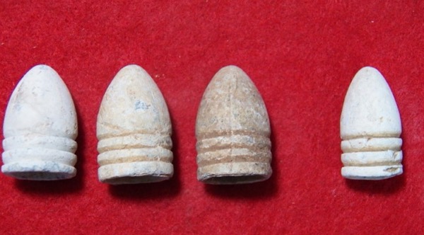 Three Excavated Civil War .69 Calibre Three-Ring Bullets