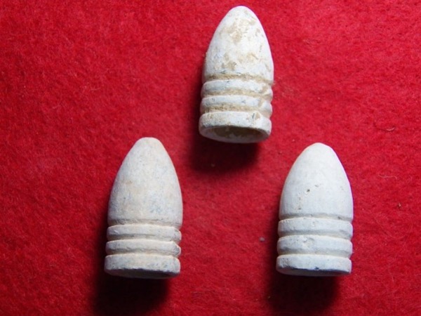 Three Excavated Civil War .58 Calibre Three-Ring Bullets