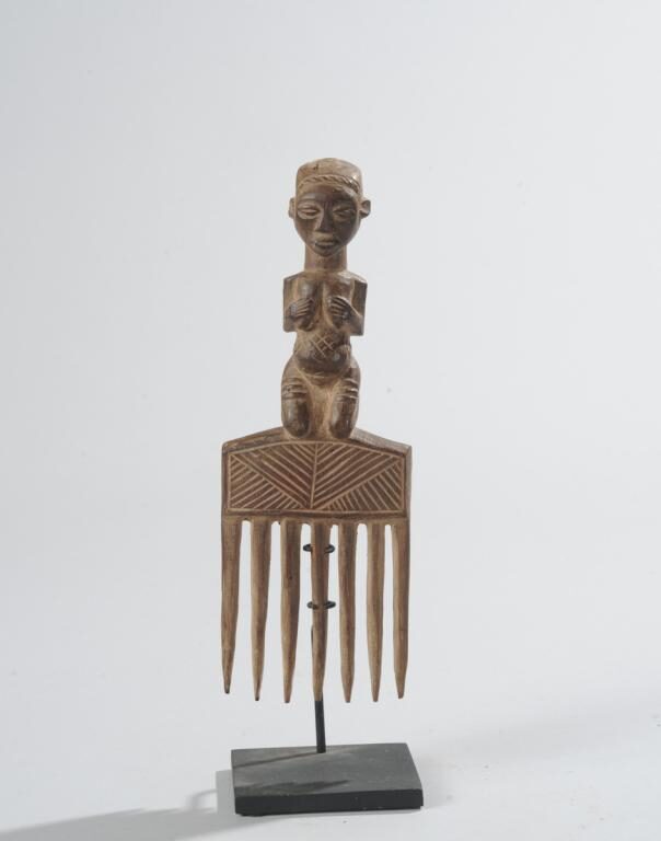 African Comb with Kneeling Female Figure