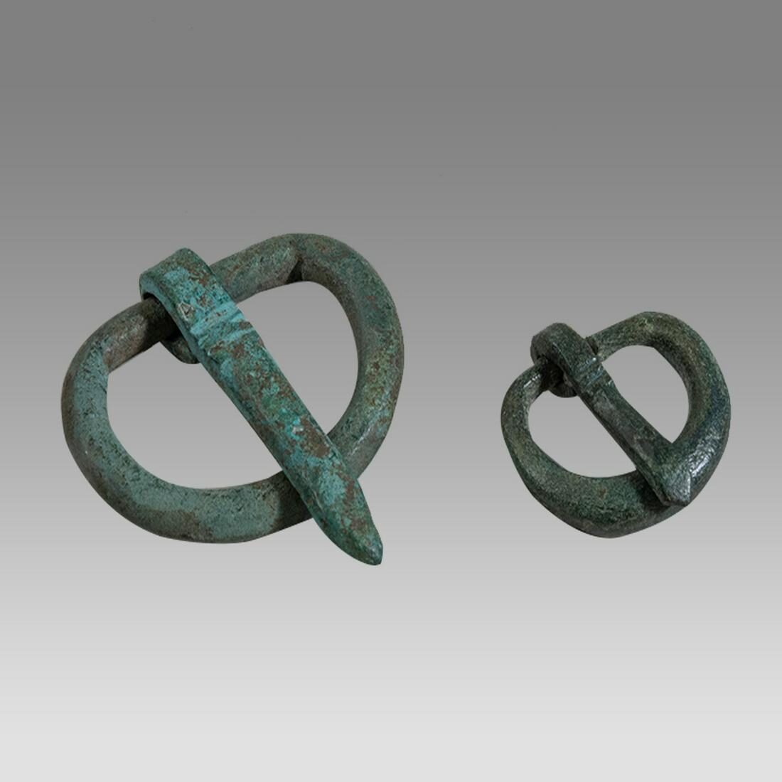 Two Roman Bronze Belt Buckles