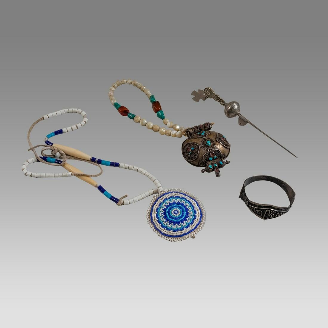 Four Middle Eastern Jewellery Ornaments