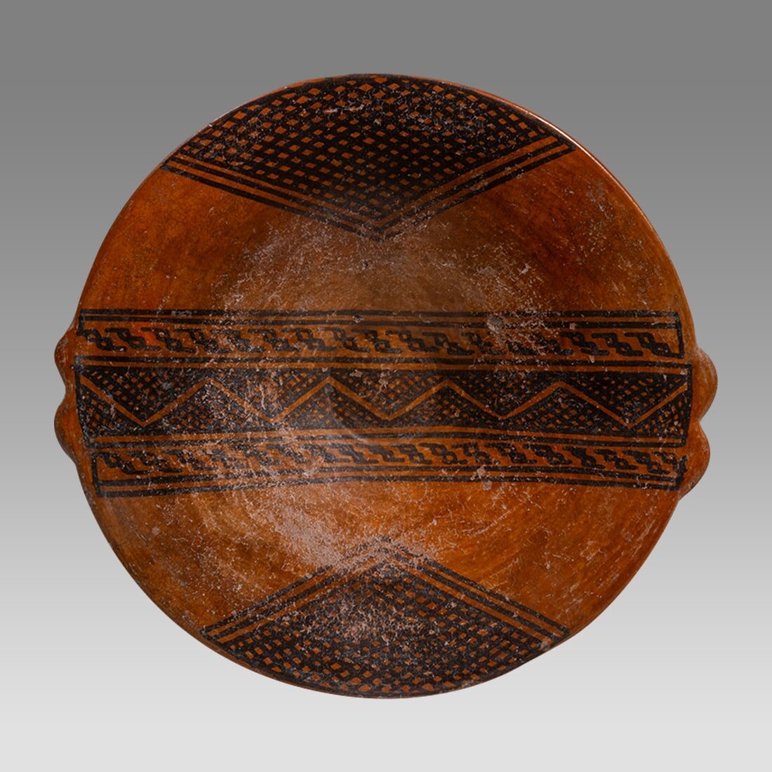Geometric-Decorated Pottery Plate