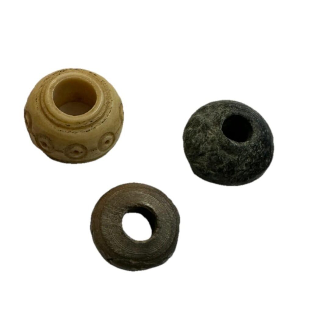 Three Roman Bone and Stone Spindles