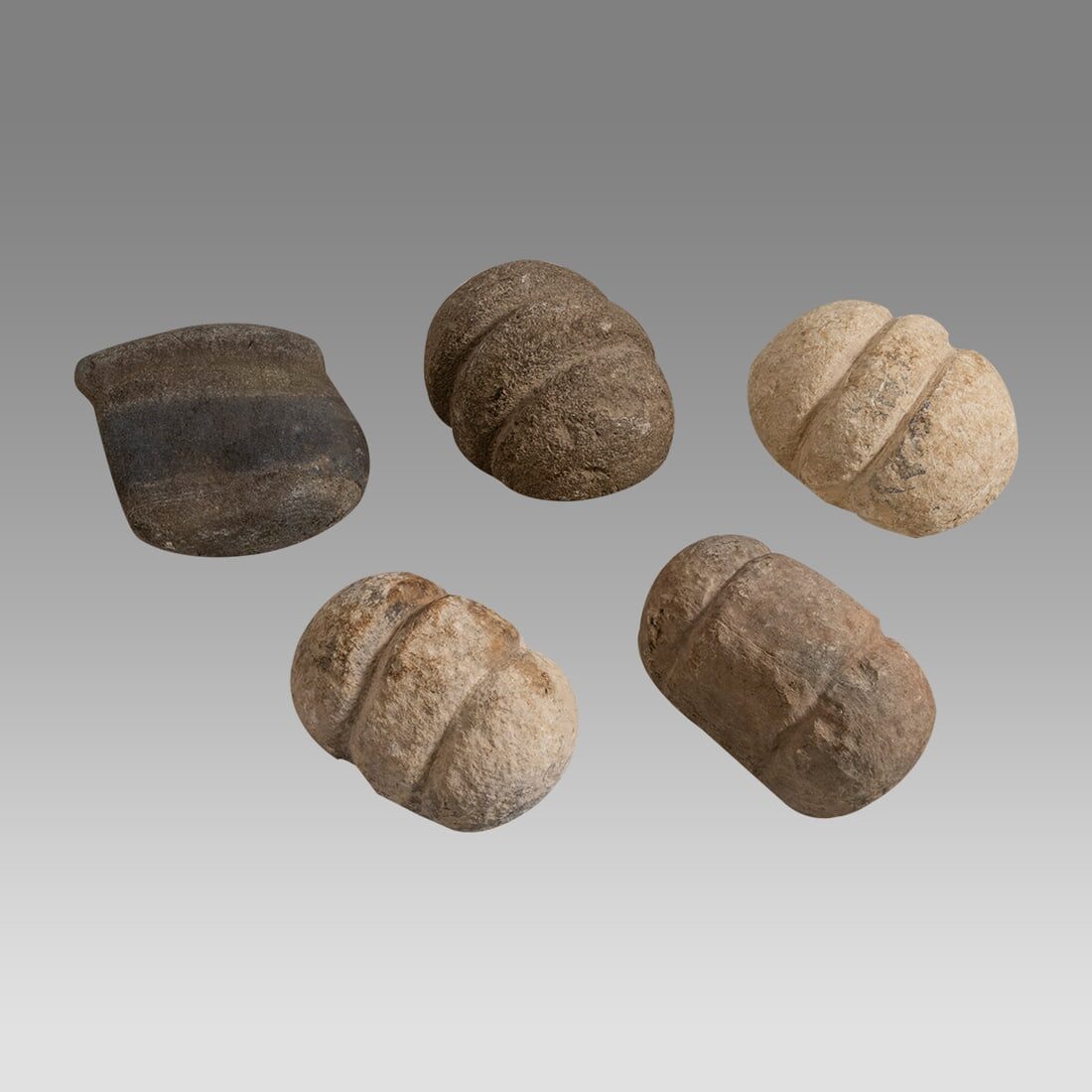 Five African Carved Stone Pestles