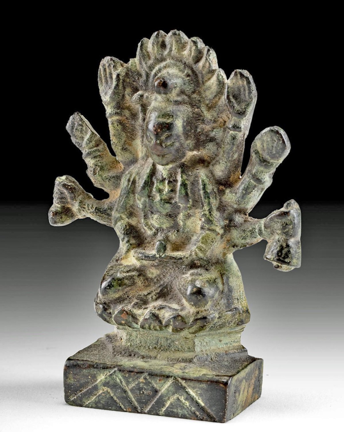 Early Nepalese Figural of Seated Deity w/ 8 Arms