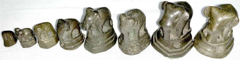 Eight Bronze Opium Weights in Elephant Form