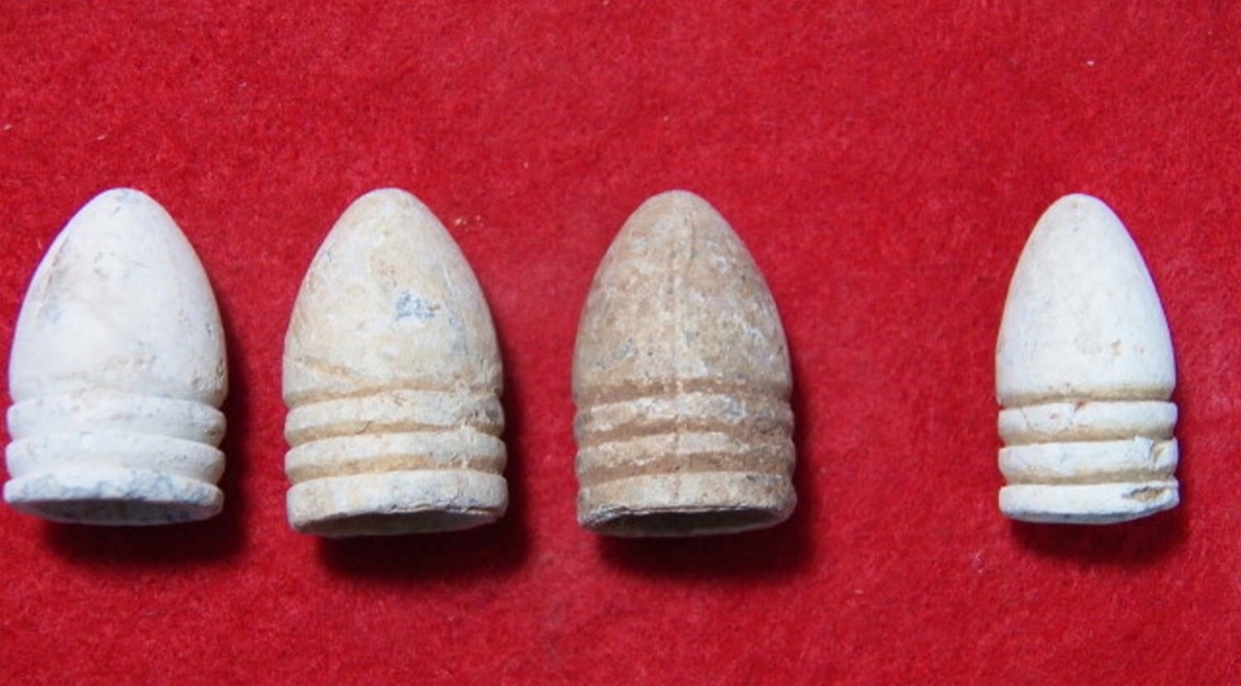 Three Excavated Civil War .69 Calibre Three-Ring Bullets